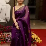 Purple Organza Saree of Nayanthara with Boat Neck Blouse